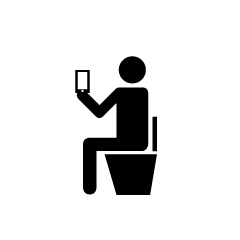 Usando el teléfono móvil en el pictograma del inodoro
